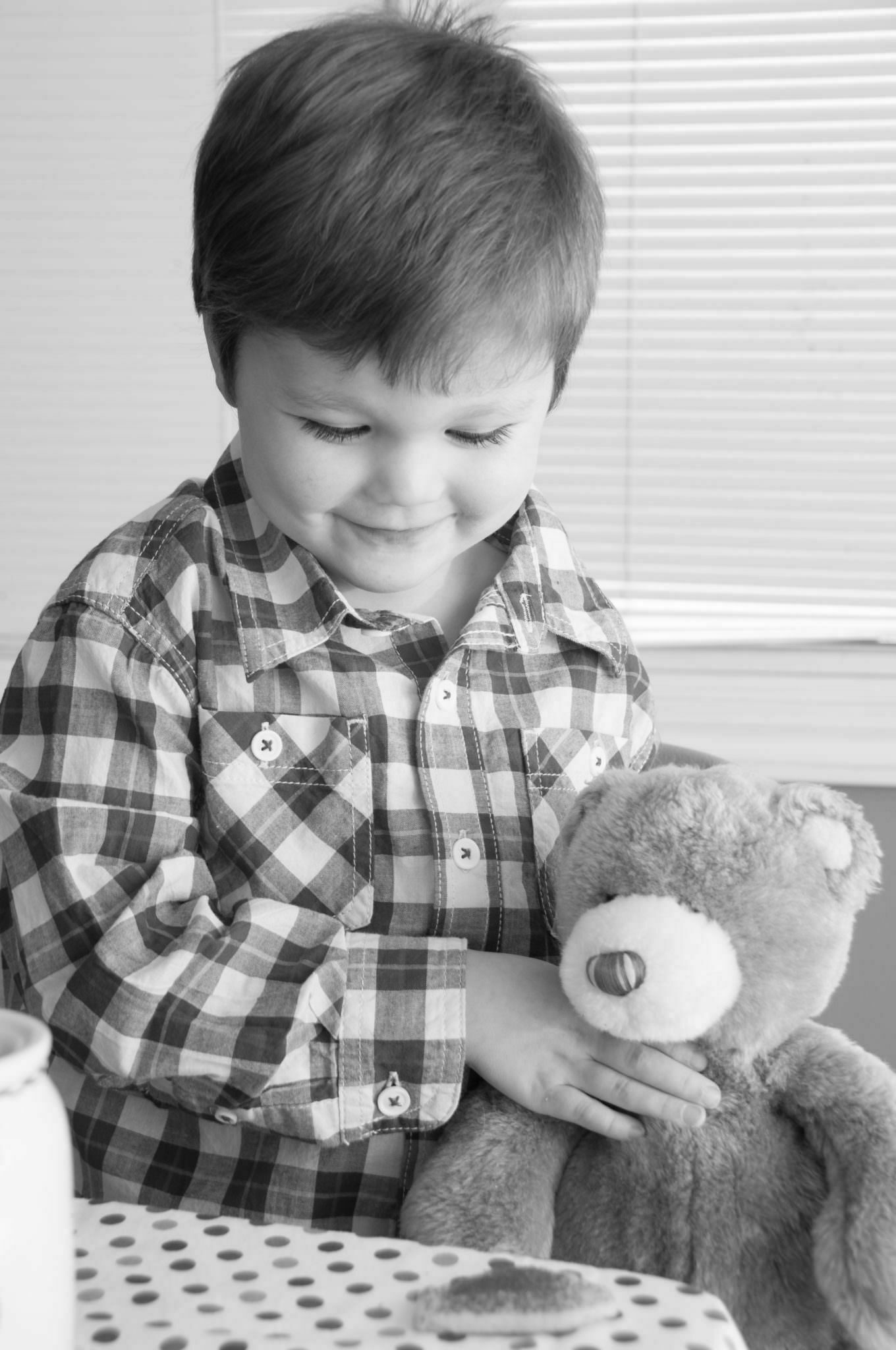 young boy with teddy bear, South Lyon Child Photography