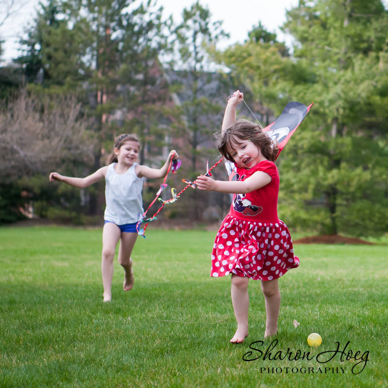 two sisters running with a kite, Metro Detroit Family Photography