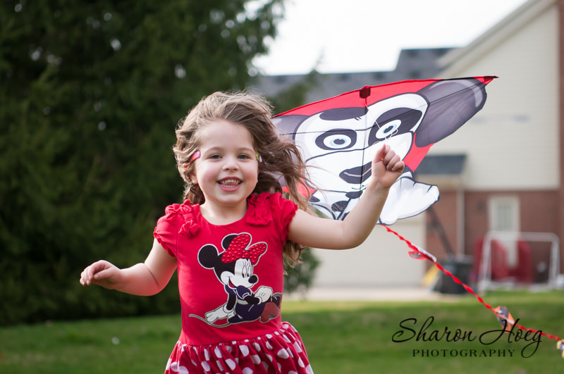 happy young girl with dog kite, Metro Detroit Child Portraits