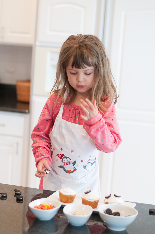 blonde child baking in the kitchen, South Lyon Child Photography