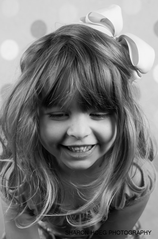 portrait photography of young girl with crazy hair, Northville Child Photographer