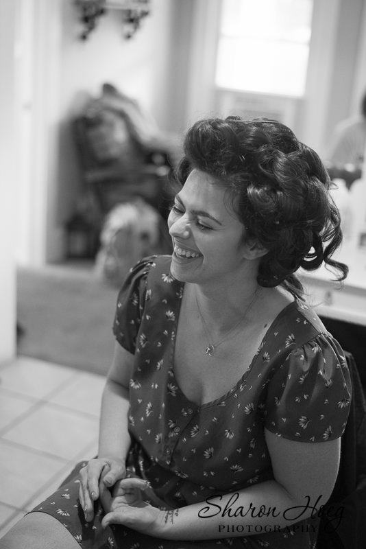 black and white of bride waiting for makeup, Livonia Documentary Wedding Photography